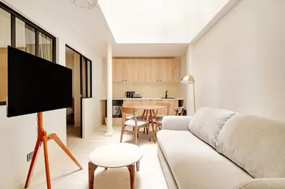 Télévision ou salle de divertissement dans l'établissement Pick A Flat's Apartments in Montparnasse - Rue La Falguière