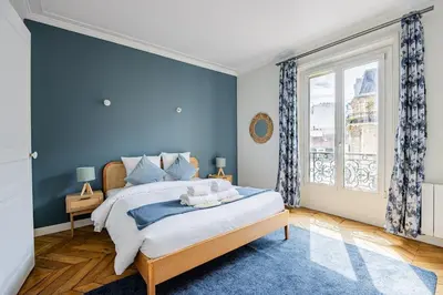 Un ou plusieurs lits dans un hébergement de l'établissement Apartment #2bedrooms #ArtsEtMétiers #République