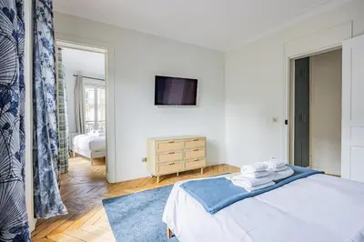 Un ou plusieurs lits dans un hébergement de l'établissement Apartment #2bedrooms #ArtsEtMétiers #République