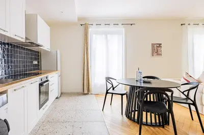 Cuisine ou kitchenette dans l'établissement Apartment #2bedrooms #ArtsEtMétiers #République