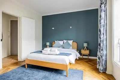 Un ou plusieurs lits dans un hébergement de l'établissement Apartment #2bedrooms #ArtsEtMétiers #République