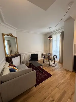 Coin salon dans l'établissement Élégant T2 sur cour Paris Goncourt