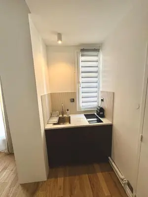 Cuisine ou kitchenette dans l'établissement Élégant T2 sur cour Paris Goncourt