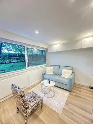 Coin salon dans l'établissement New, modern and bright studio