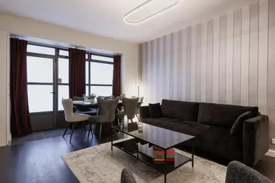 Coin salon dans l'établissement Chic et Comfort in the Heart of the Sentier