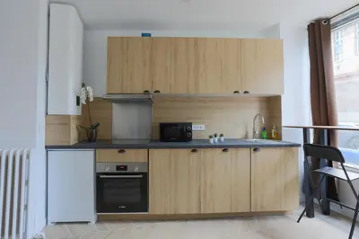 Cuisine ou kitchenette dans l'établissement Le Zen