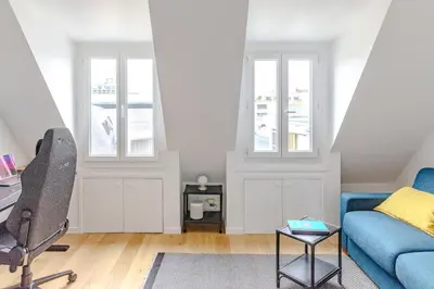 Coin salon dans l'établissement Charming studio near Luxembourg Garden, Pantheon view
