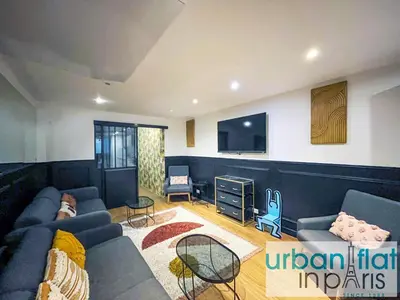 Coin salon dans l'établissement UrbanFlat 31 - Triplex Loft in Central Paris
