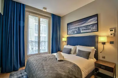 Un ou plusieurs lits dans un hébergement de l'établissement UrbanFlat 75 - Grand Apartment near Jardin du Luxembourg