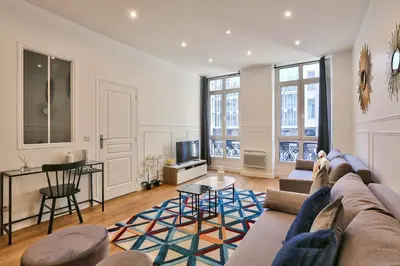 Coin salon dans l'établissement UrbanFlat 34 - Spacious & Bright Paris Home for 11