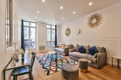Coin salon dans l'établissement UrbanFlat 34 - Spacious & Bright Paris Home for 11