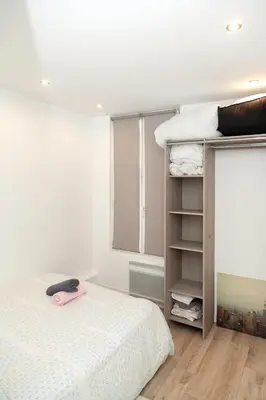 Un ou plusieurs lits dans un hébergement de l'établissement Cosy deux pièces