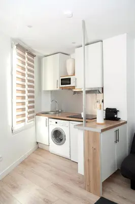 Cuisine ou kitchenette dans l'établissement Cosy deux pièces