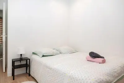 Un ou plusieurs lits dans un hébergement de l'établissement Cosy deux pièces