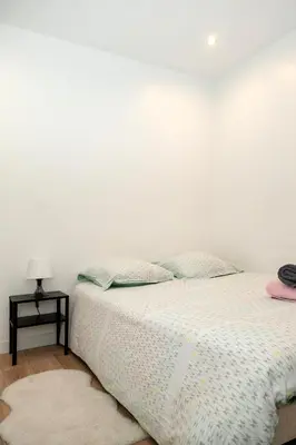 Un ou plusieurs lits dans un hébergement de l'établissement Cosy deux pièces