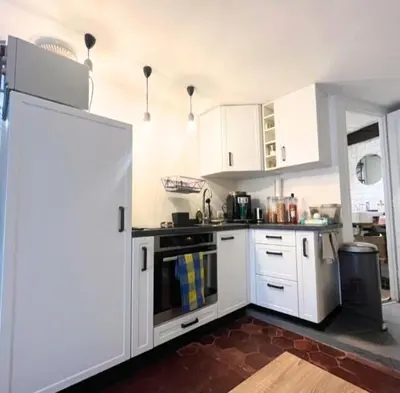 Cuisine ou kitchenette dans l'établissement Charming two rooms