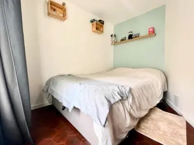Un ou plusieurs lits dans un hébergement de l'établissement Charming two rooms
