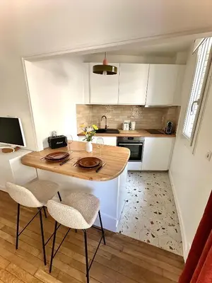 Cuisine ou kitchenette dans l'établissement Cozy Parisian Apartment newly renovated