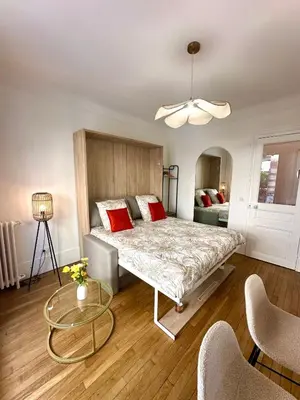 Un ou plusieurs lits dans un hébergement de l'établissement Cozy Parisian Apartment newly renovated