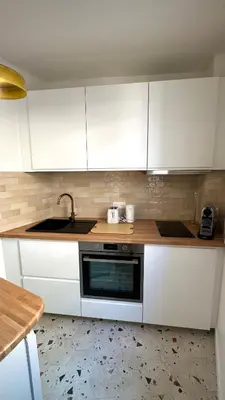 Cuisine ou kitchenette dans l'établissement Cozy Parisian Apartment newly renovated