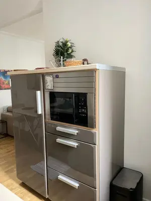 Cuisine ou kitchenette dans l'établissement Cozy studio in charming residence