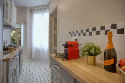 Cuisine ou kitchenette dans l'établissement Apart Paris Opera 2BR