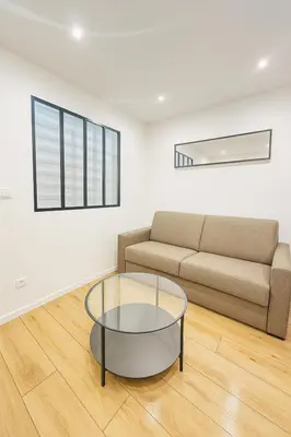 Coin salon dans l'établissement Flat near Bois de Vincennes