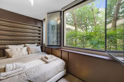 Un ou plusieurs lits dans un hébergement de l'établissement Ultra luxury and garden!