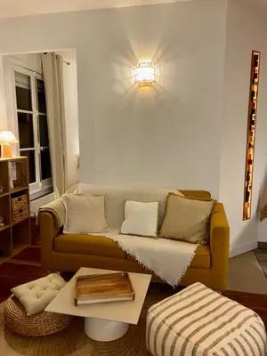 Coin salon dans l'établissement Charmant 2 pièces cosy - Paris 15ème