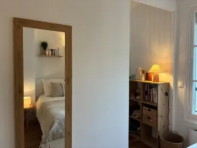 Un ou plusieurs lits dans un hébergement de l'établissement Charmant 2 pièces cosy - Paris 15ème