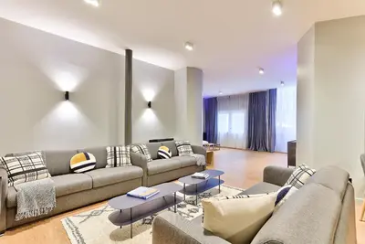 Coin salon dans l'établissement UrbanFlat 124 - Spacious Home in the Heart of Paris