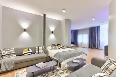 Coin salon dans l'établissement UrbanFlat 124 - Spacious Home in the Heart of Paris