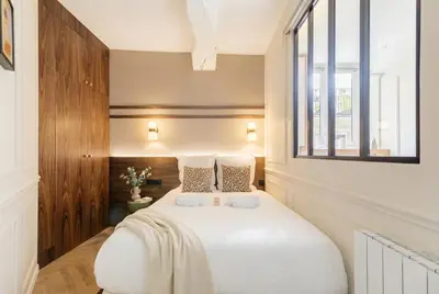 Un ou plusieurs lits dans un hébergement de l'établissement PoeticStay - Montorgueil