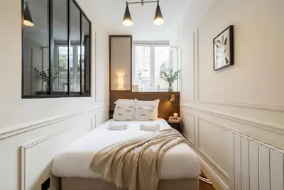 Un ou plusieurs lits dans un hébergement de l'établissement PoeticStay - Montorgueil