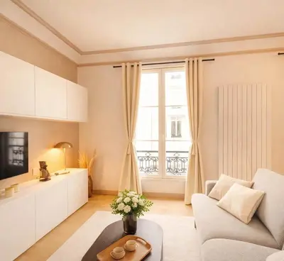 Un ou plusieurs lits dans un hébergement de l'établissement Champs Elysees - Deluxe apartment with lift for 4