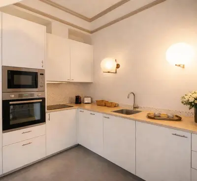 Cuisine ou kitchenette dans l'établissement Champs Elysees - Deluxe apartment with lift for 4