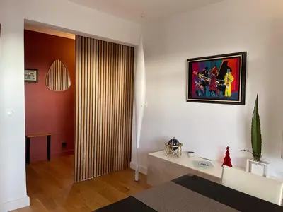 Un ou plusieurs lits dans un hébergement de l'établissement Nos Maisons Cosy - Paris
