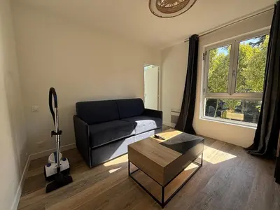 Coin salon dans l'établissement Appartement neuf Palais des Congrès Porte Maillot 30