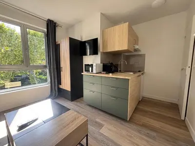 Cuisine ou kitchenette dans l'établissement Appartement neuf Palais des Congrès Porte Maillot 30