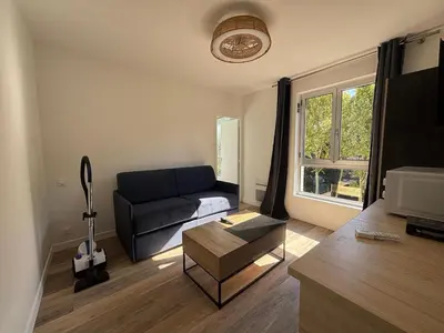 Coin salon dans l'établissement Appartement neuf Palais des Congrès Porte Maillot 30