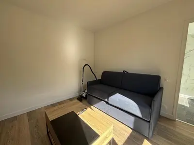 Coin salon dans l'établissement Appartement neuf Palais des Congrès Porte Maillot 30