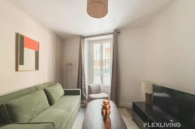 Coin salon dans l'établissement Charming 27m one-bedroom apartment in Paris 20 with shared terrace