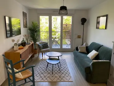 Coin salon dans l'établissement Appartement 3 pièces - Proche Paris