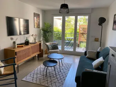 Télévision ou salle de divertissement dans l'établissement Appartement 3 pièces - Proche Paris