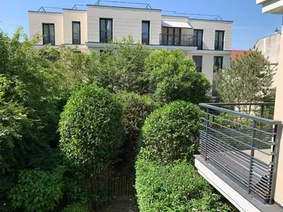 Jardin de l'établissement Appartement 3 pièces - Proche Paris