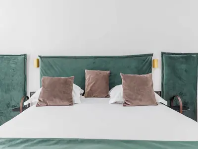 Un ou plusieurs lits dans un hébergement de l'établissement Charming duplex - 2BR 6P - Saint Germain