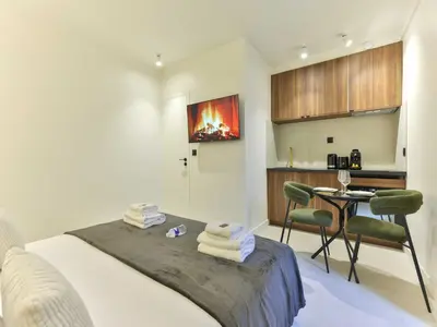 Un ou plusieurs lits dans un hébergement de l'établissement Cozy apartment - 1BR 2P - Grenelle Eiffel Tour