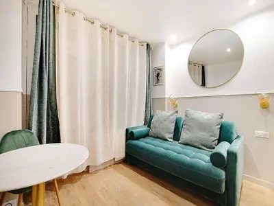 Coin salon dans l'établissement Comfort apartment 1BD 4P with AC - Near Montmartre