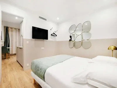 Un ou plusieurs lits dans un hébergement de l'établissement Comfort apartment 1BD 4P with AC - Near Montmartre