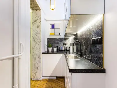 Cuisine ou kitchenette dans l'établissement Moderne apartment - 1BR 4P - Champs-Élysées